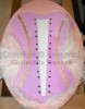 Corset sur lit de plumes